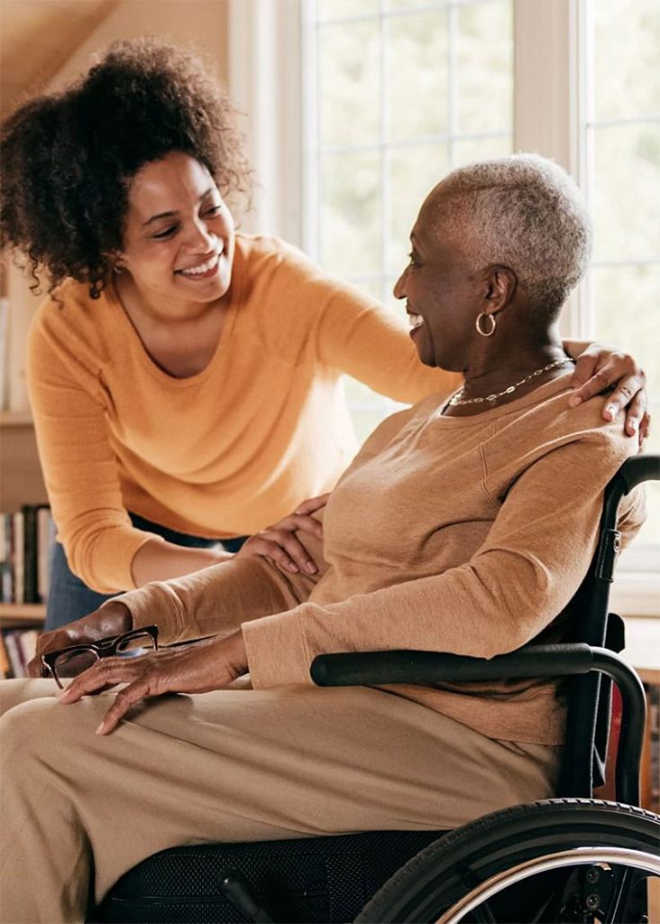 Caregiver assisting a patient at home